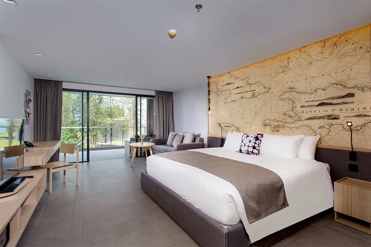 Deluxe Poolside room terrace overlooking pool